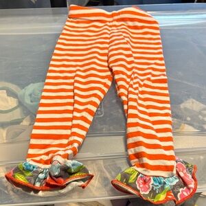 Orange striped pants with bell bottoms